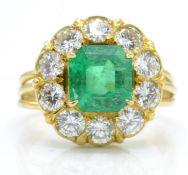 An 18ct Gold Emerald & Diamond Cluster Ring