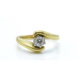 An 18ct Gold & Diamond Solitaire Crossover Ring