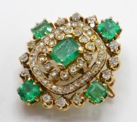 A French 18ct gold, emerald and diamond brooch pin