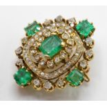 A French 18ct gold, emerald and diamond brooch pin