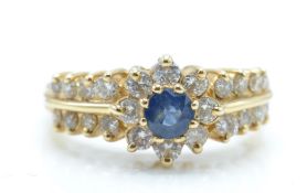 A 14ct gold sapphire and diamond ring. The ring be