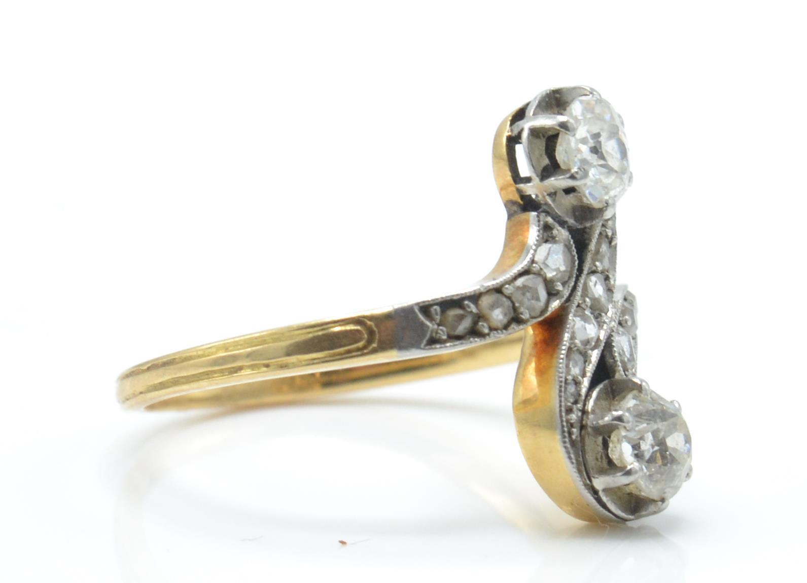 An early 20th century diamond crossover ring. The - Image 4 of 4