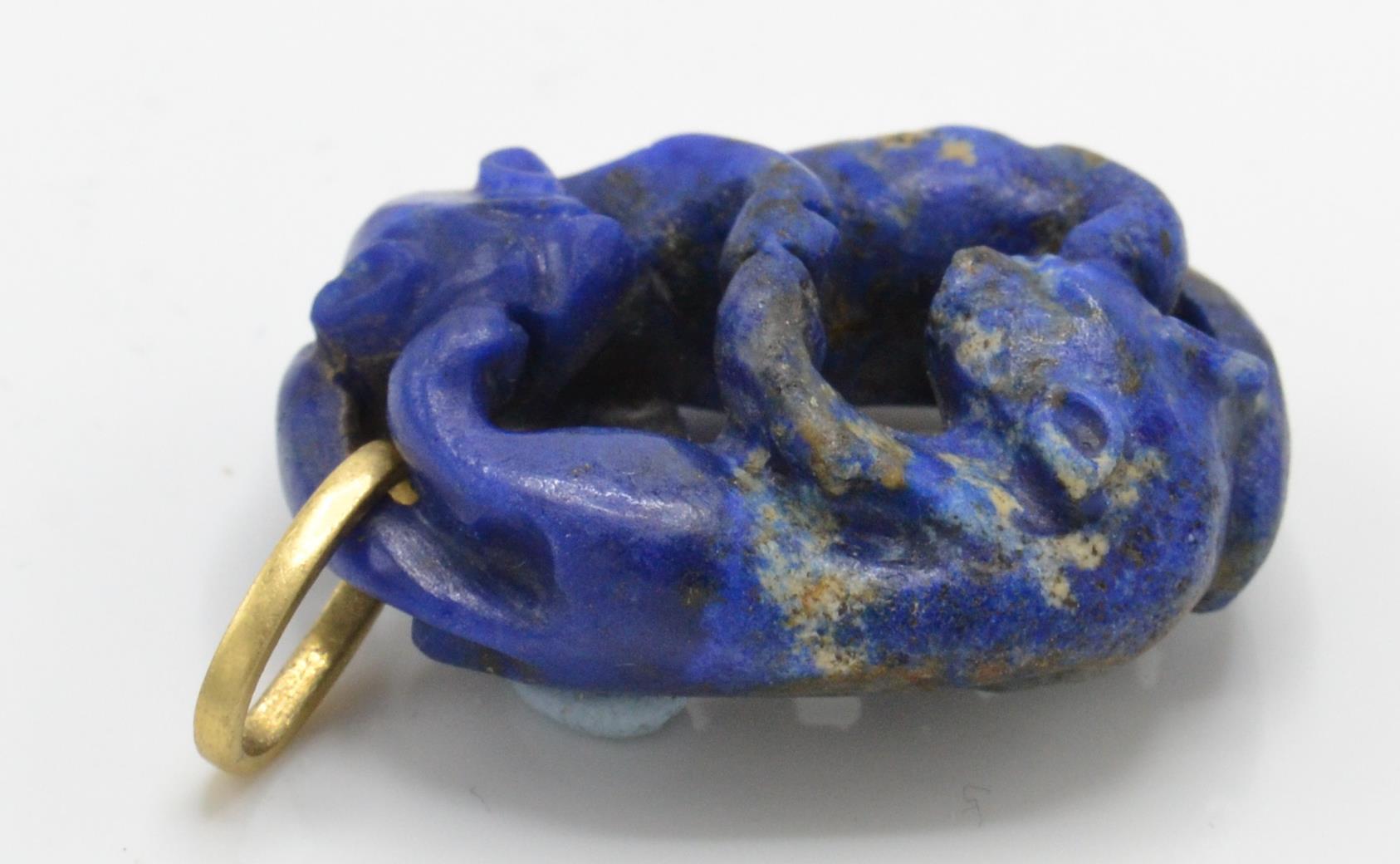 A gold and Lapis Lazuli figural pendant. The penda - Image 3 of 3