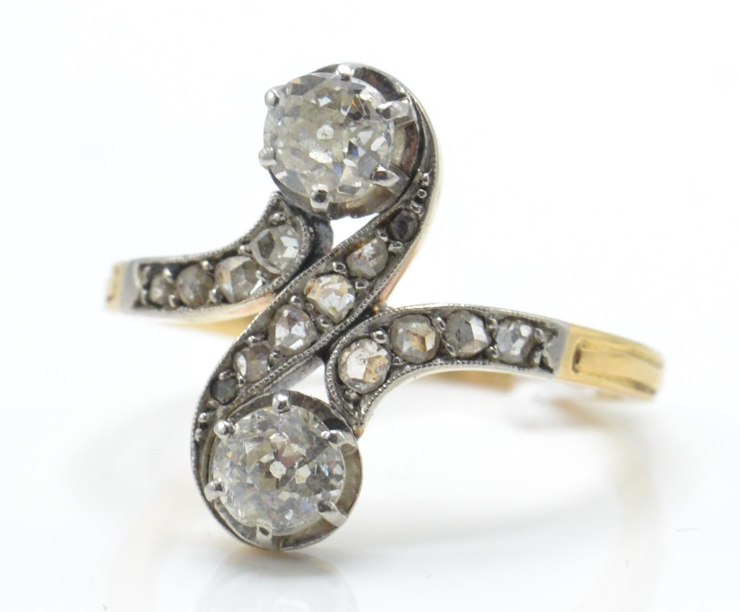 An early 20th century diamond crossover ring. The - Image 2 of 4