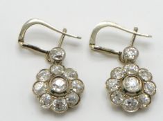 A pair of 18ct gold early 20th century diamond clu