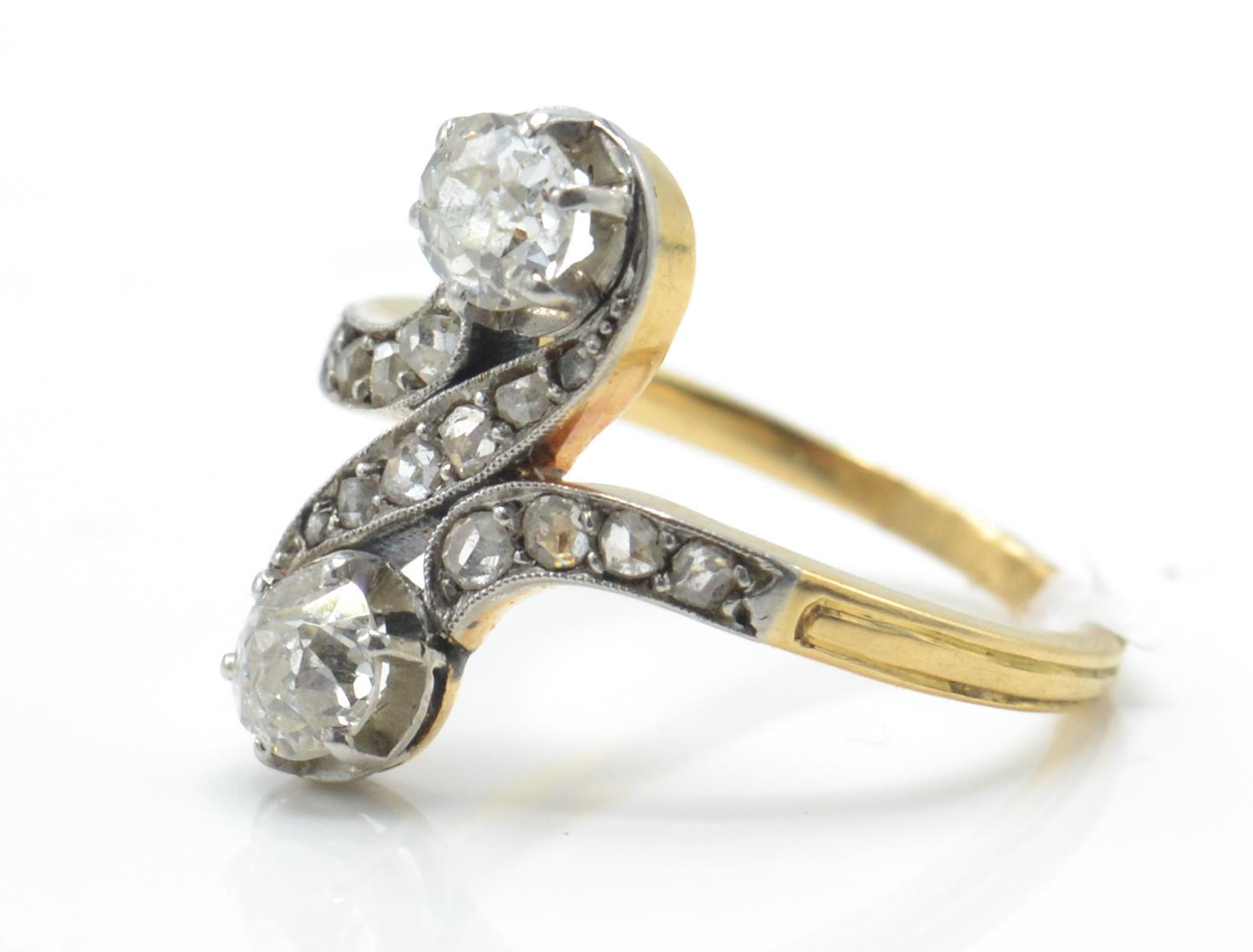 An early 20th century diamond crossover ring. The - Image 3 of 4