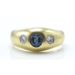 A 14ct / 585 gold sapphire and diamond dome ring.