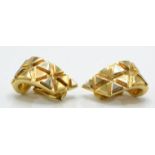 A pair of 18ct gold French signed ear clips. The e