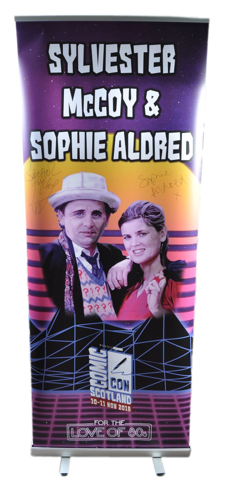 MONOPOLY EVENTS - AUTOGRAPHED BANNER - SYLVESTER MCCOY, SOPHIE ALDRED