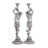 PAIR OF 19TH CENTURY POLISHED SPELTER FIGURAL CAND