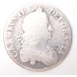 A 17th Century Charles II silver crown coin with a rubbed date (168?), poor condition. Weight 28.7g.