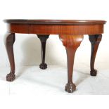 A good 19th Century Victorian flamed mahogany oval extending dining table raised on cabriole legs