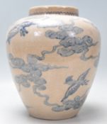 A 19th century Kang-xi Chinese bulbous ginger jar in blue and white colourway depicting birds flying