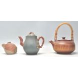 A collection of 3 Chinese Yixing teapots to include a blue ground example with floral decoration,