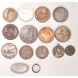 An interesting collection of 19th and 20th Century tokens and medallions to include a Moet Chandon