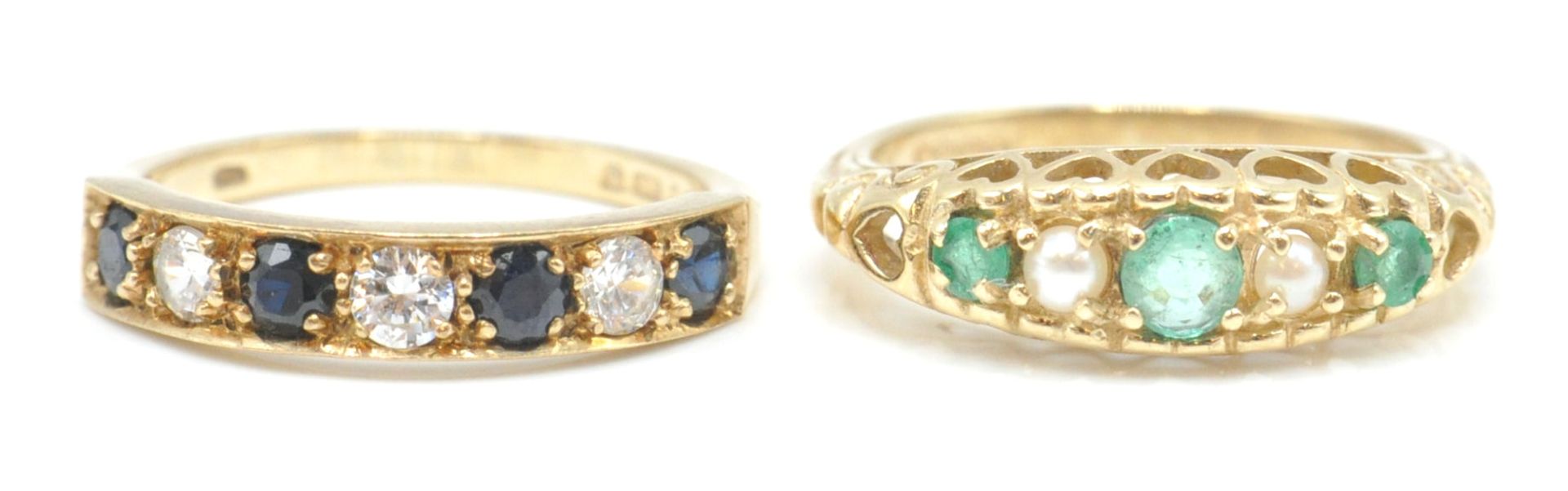 2 9ct gold hallmarked rings. To include a 9ct Birmingham hallmarked emerald and half pearl ring