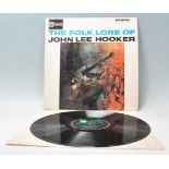 A vinyl long play LP record album by John Lee Hooker – The Folk Lore Of – Original Stateside 1st U.