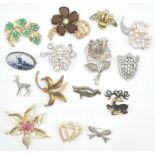 A collection of vintage costume jewellery brooches to include, enamel set bee, delft, rhinestone