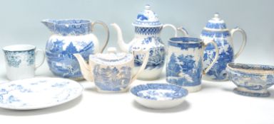 A collection of 19th and early 20th century blue and white ' willow ' pattern ceramics to include