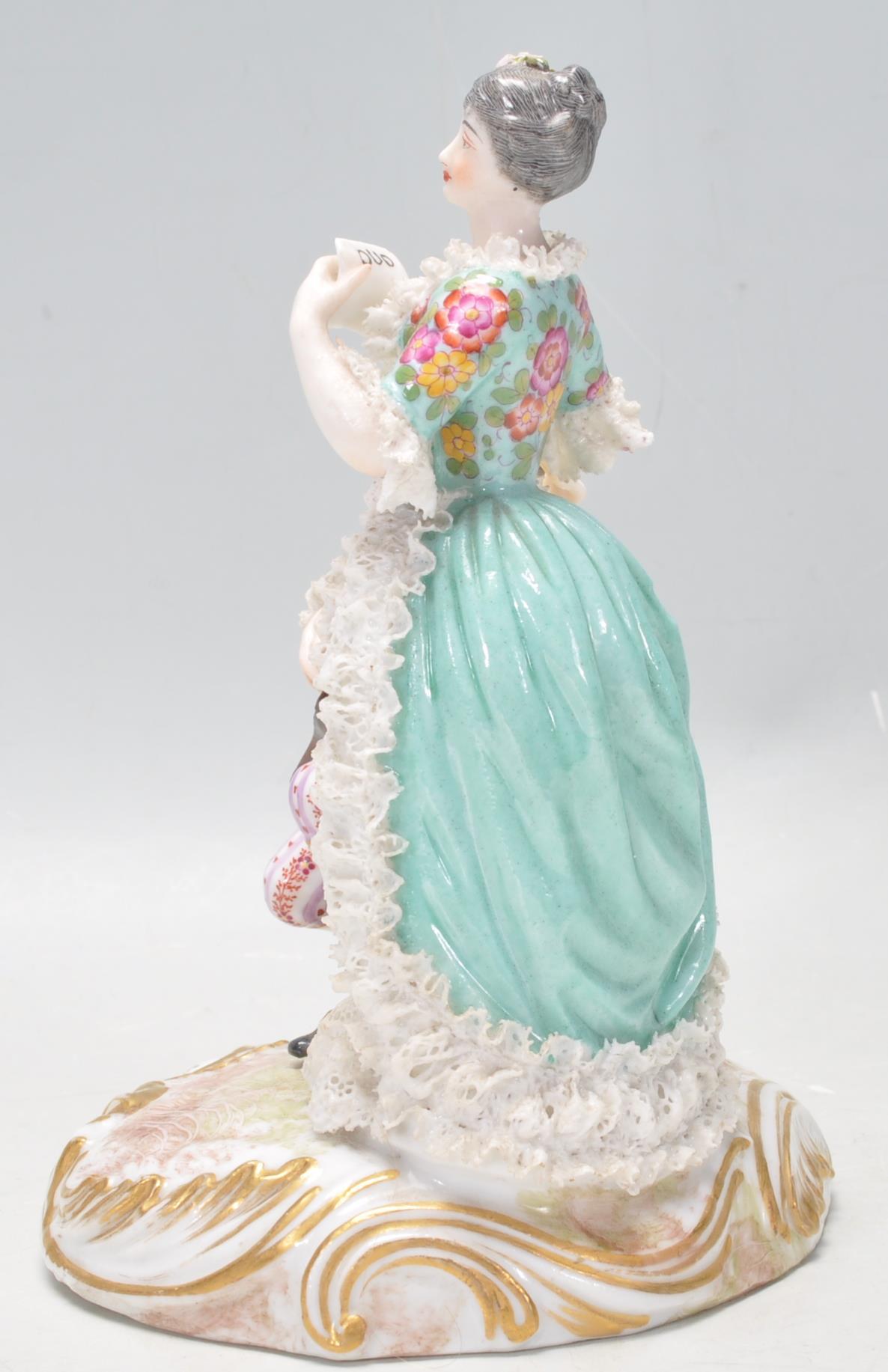 A 20th Century German Meissen / Dresden group figurine in the form of a couple with a seated man - Image 5 of 13