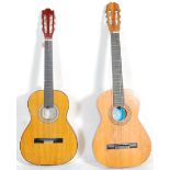Two vintage six string acoustic guitars to include a Artist Quality Guitar. Together with a BM