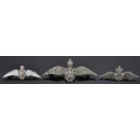 A group of three silver RAF brooches to include one with white enamelled wings (hallmarked