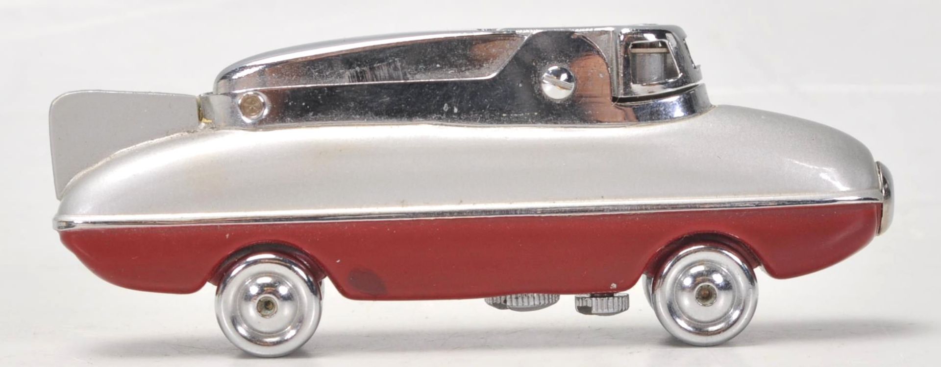 A mid 20th Century 1950's Sarome Bluebird novelty cigarette lighter, finished in red and grey with - Image 2 of 7