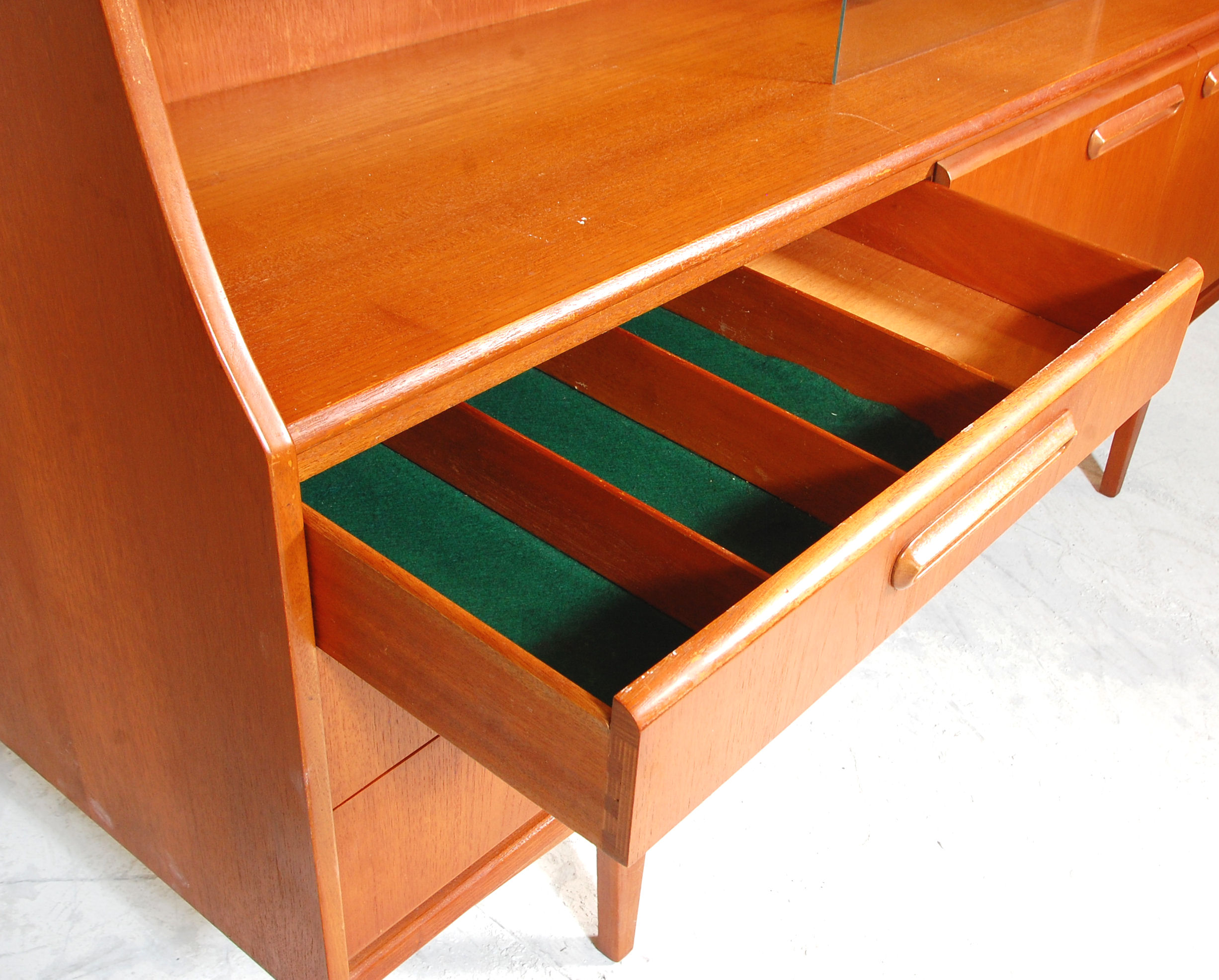 A retro mid 20th Century teak wood sideboard / highboard having a drop down cocktail cabinet to - Image 3 of 10