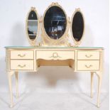 A 19th Century Louis style mirror back dressing table having a kidney shaped dresser base with