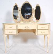 A 19th Century Louis style mirror back dressing table having a kidney shaped dresser base with