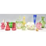 A group of 19th Century Victorian coloured glass vases to include a yellow and white vase with