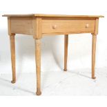 A 19th Century Victorian oak writing table desk /  side table having a single drawer with knob