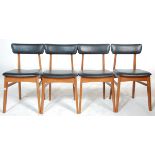A good set of four retro mid 20th Century teak framed dining chairs raised on splayed legs united by