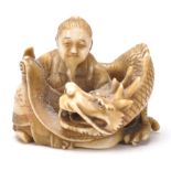 An antique Chinese ivory Netsuke toggle intricatel