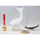 A collection of vintage retro 20th Century glass to include a large cased glass fish ornament, a