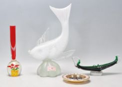 A collection of vintage retro 20th Century glass to include a large cased glass fish ornament, a