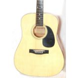 A good Chantry made acoustic guitar having a black