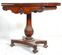 A 19th century Regency William IV mahogany card - games table. Raised on a quadruped base with bun