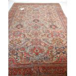 A good large vintage 20th Century floor rug having cream ground with floral and pattern decoration