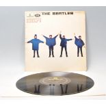A vinyl long play LP record album by The Beatles – Help – Original Parlophone 1st U.K. Press – PMC