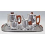 A retro mid century Sona stainless steel Coffee & Tea service complete with tray having teapot,