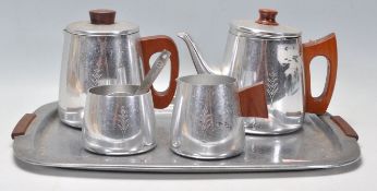 A retro mid century Sona stainless steel Coffee & Tea service complete with tray having teapot,