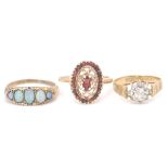 3 hallmarked 9ct gold rings. To include and opal set 5 stone ring size N, an openwork garnet set