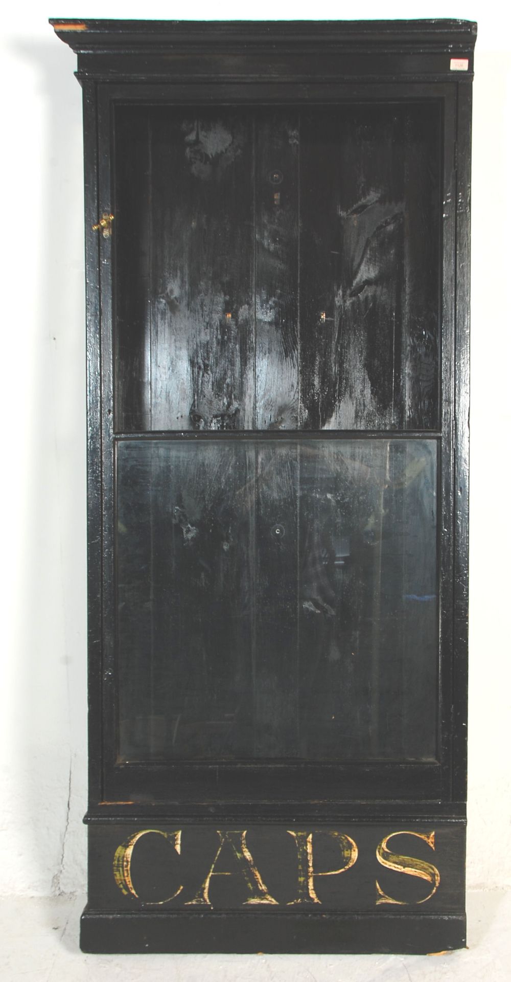 A 19th century Victorian shop haberdashery  display unit / display cupboard having a glazed door