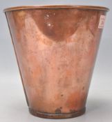 A vintage copper ice bucket of tapering form having a banded rim. Measures 19cm tall with a diameter