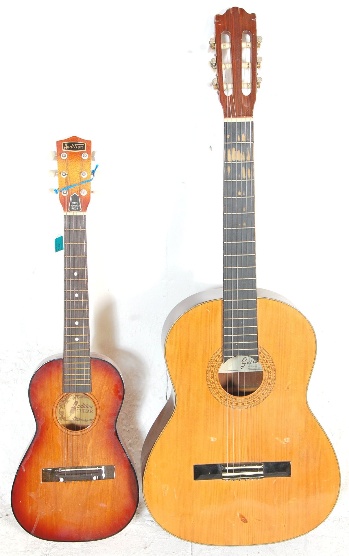 A vintage Audition made acoustic six string guitar