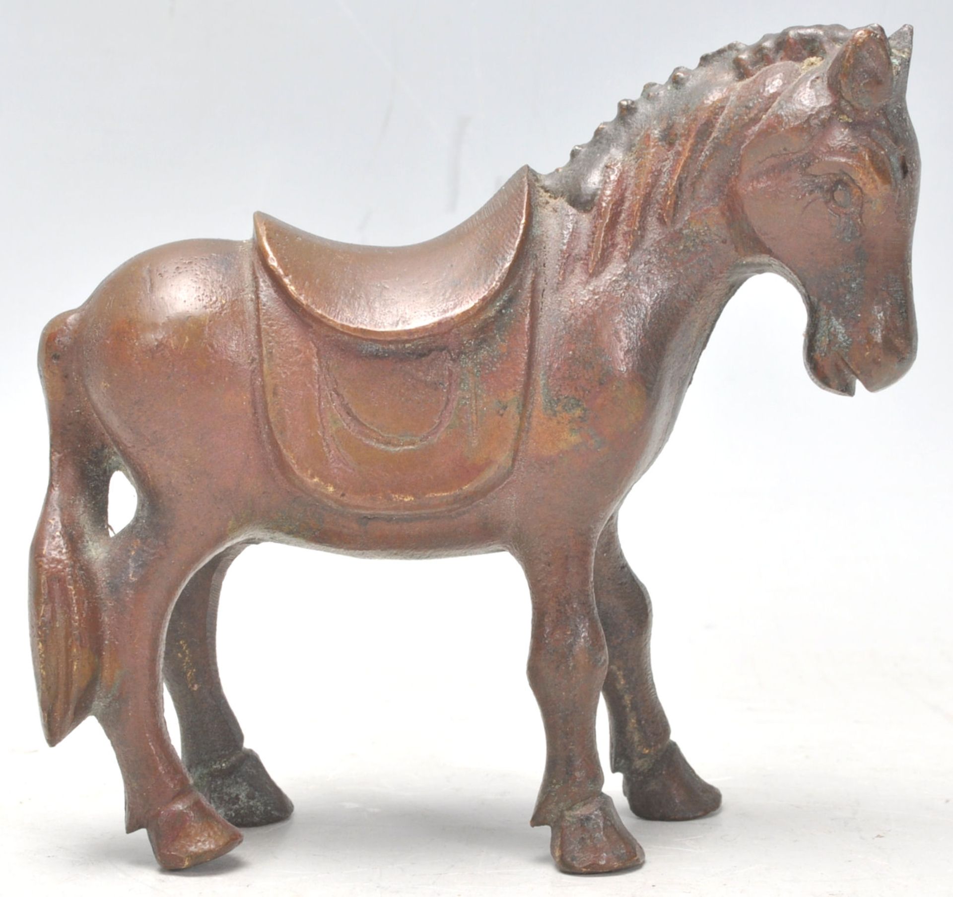 A mid 20th Century cast bronze figure in the form of a horse in a standing position having a - Bild 2 aus 7