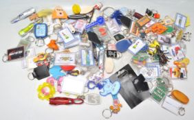 A large collection of assorted collectable / novelty key rings / key chains, including advertising