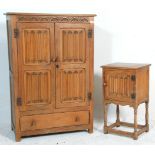 An early 20th century Jacobean revival carved oak bachelors wardrobe and matching bedside put