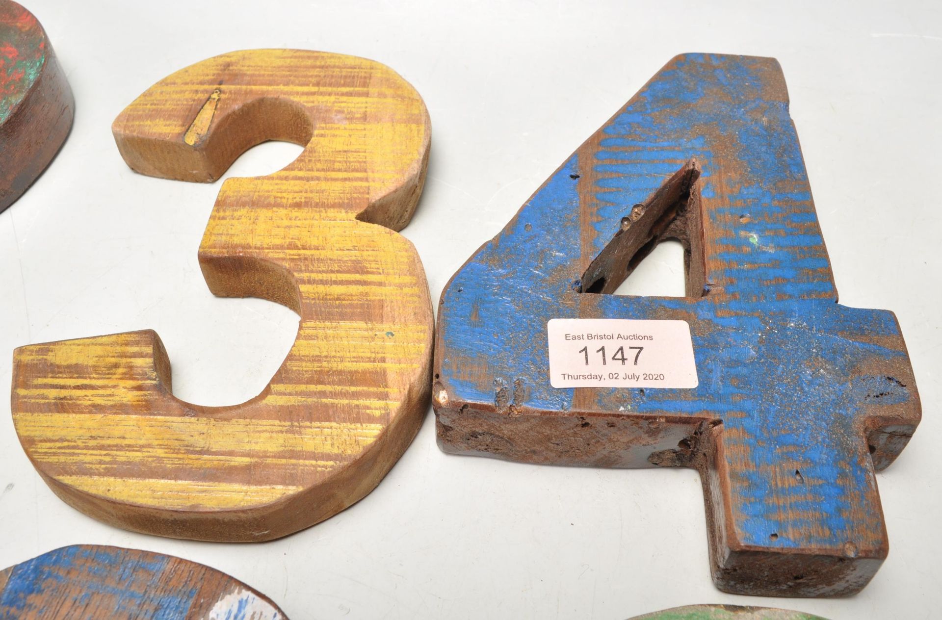 A set of vintage retro wooden signage numbers each having weathered different coloured paintwork - Image 3 of 8